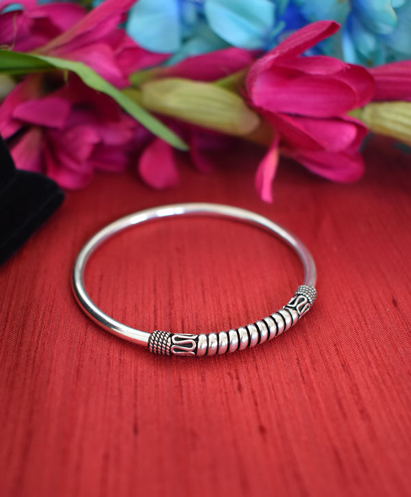 Circular Design Silver Bangle